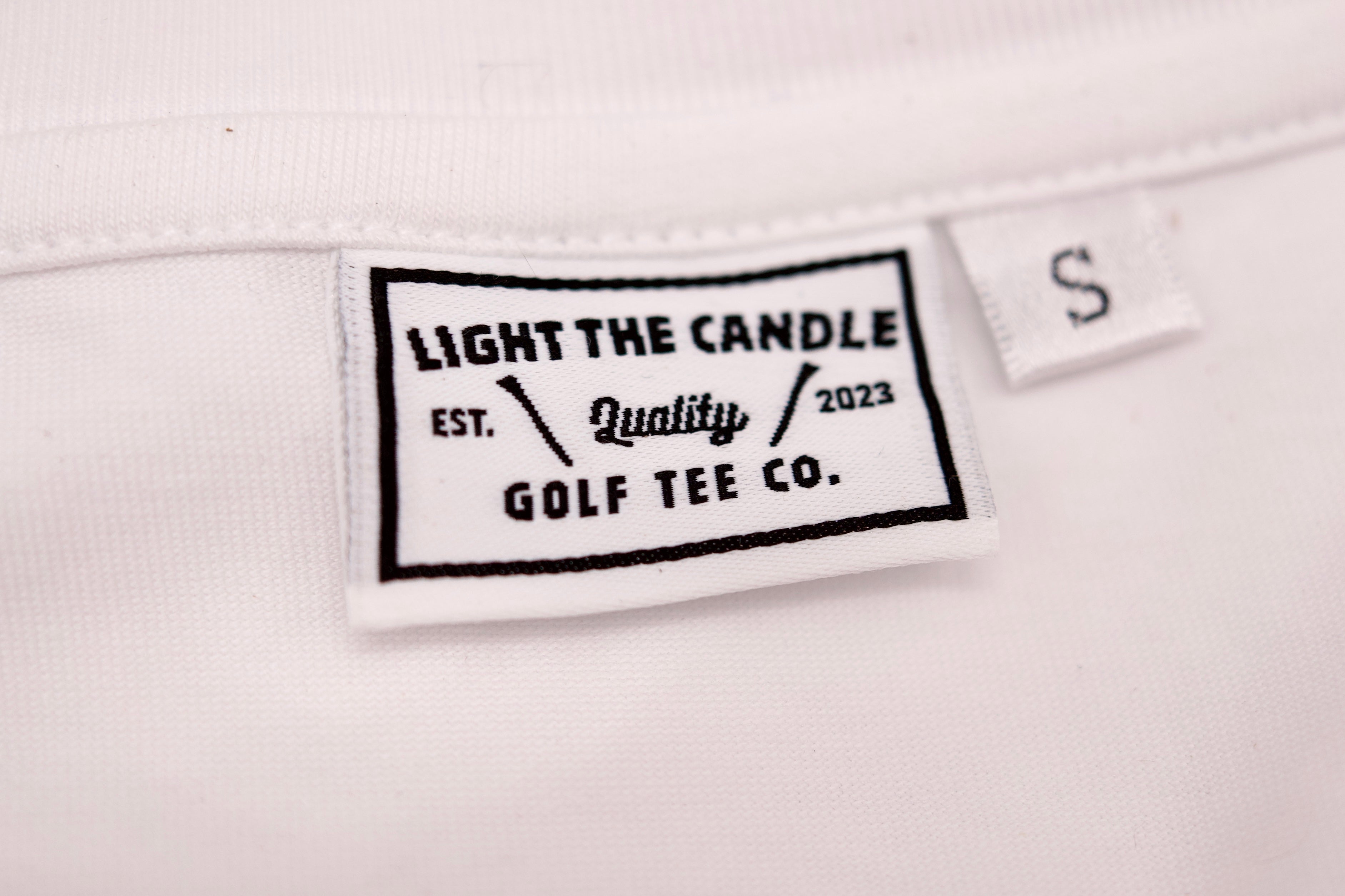 "Light The Candle." T-Shirt